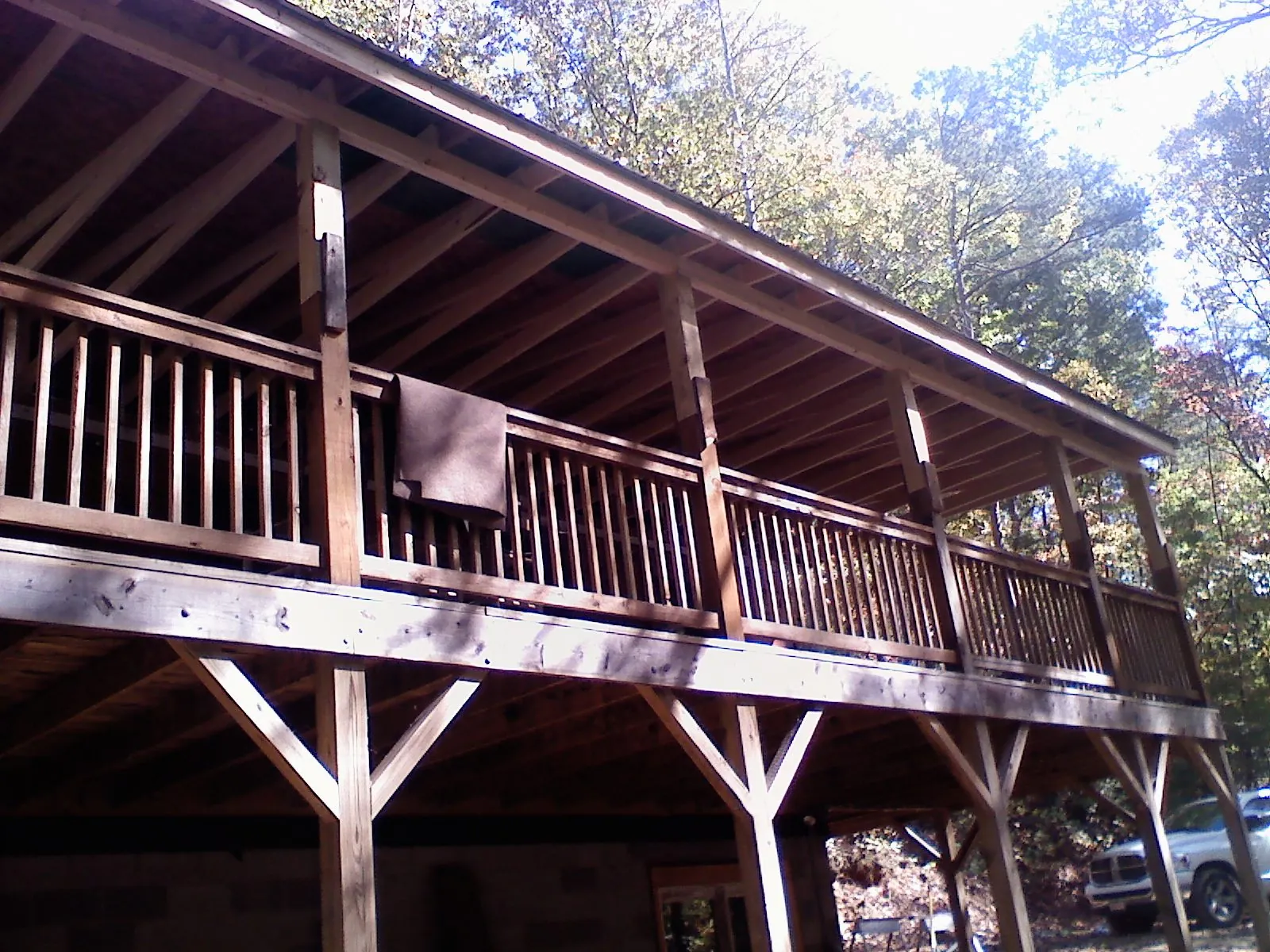 Timber framing under a new elevated porch and deck — Roof Leak Repair in Monmouth by Roofing Brothers